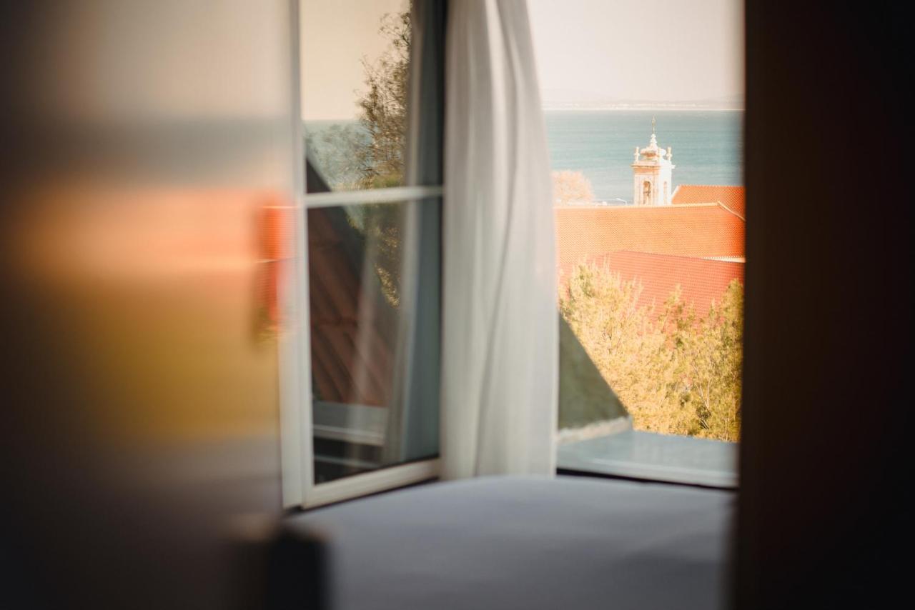 A House In Estoril - Adults Only Hotel Exterior photo View of the lighthouse from the window of the house